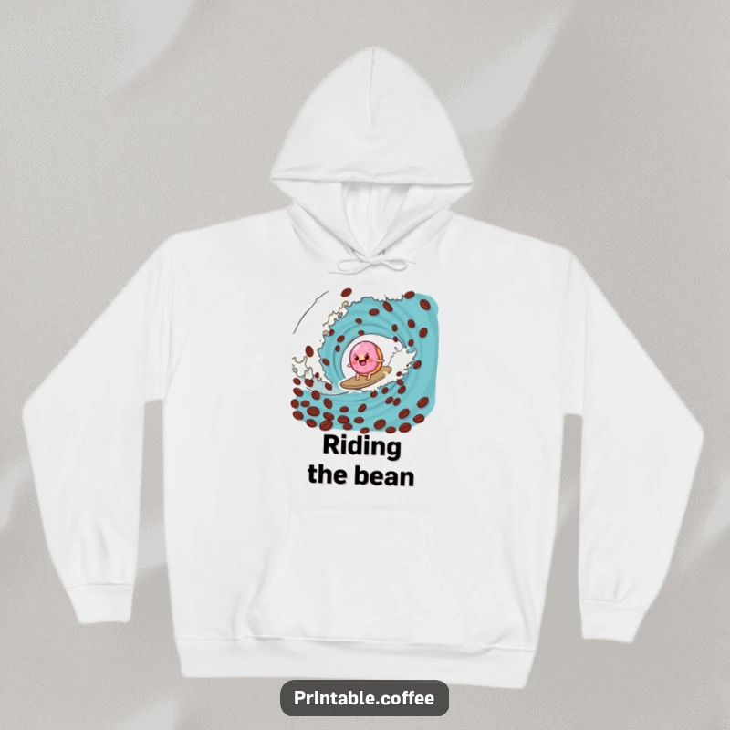 Funny donut hoodie showing a wobbly jelly donut surfing a giant coffee bean wave, combining warmth with humorous art.